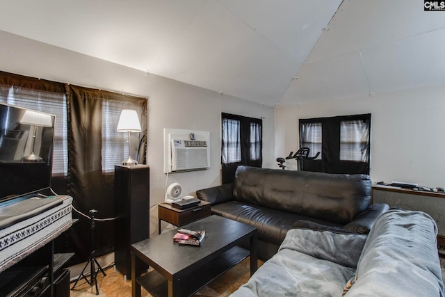 2700 Magnolia St, Columbia, SC 29204 - living room featuring plenty of natural light, lofted ceiling, and an AC wall unit