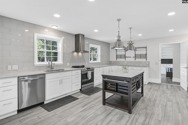 15 Glenlake Rd, Columbia, SC 29223 - kitchen with wall chimney range hood, stainless steel appliances, decorative backsplash, and a sink