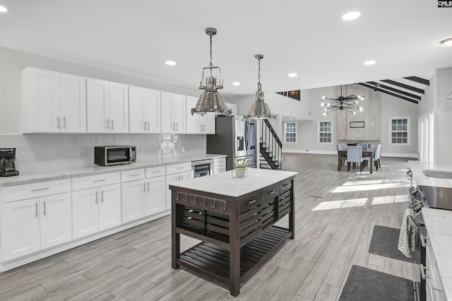 15 Glenlake Rd, Columbia, SC 29223 - kitchen featuring an inviting chandelier, stainless steel appliances, white cabinets, light wood-type flooring, and recessed lighting