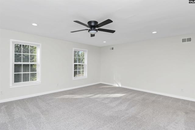 15 Glenlake Rd, Columbia, SC 29223 - carpeted spare room with baseboards, a wealth of natural light, and visible vents