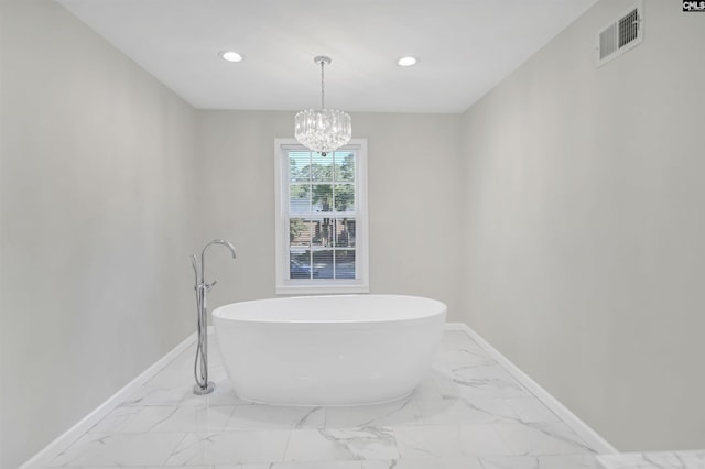15 Glenlake Rd, Columbia, SC 29223 - full bathroom with marble finish floor, visible vents, a chandelier, a soaking tub, and baseboards