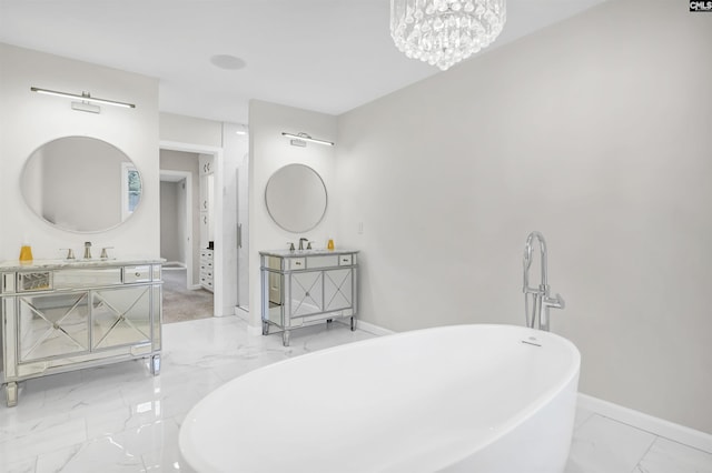 15 Glenlake Rd, Columbia, SC 29223 - full bath featuring marble finish floor, baseboards, two vanities, and a sink
