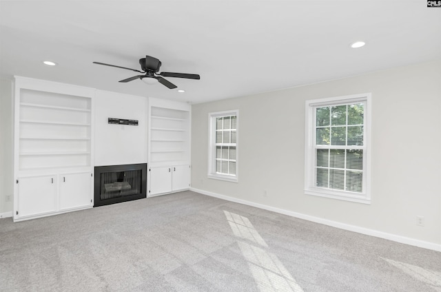 15 Glenlake Rd, Columbia, SC 29223 - unfurnished living room featuring carpet, baseboards, and ceiling fan
