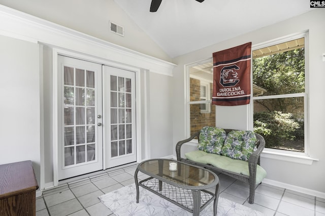 living area featuring lofted ceiling, french doors, ceiling fan, visible vents, and tile patterned floors