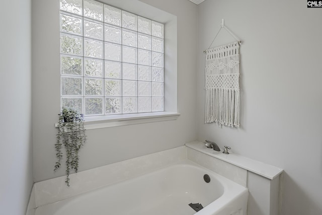 bathroom featuring a bath