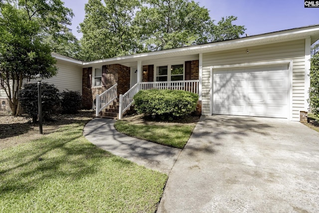 ranch-style home with covered porch, an attached garage, brick siding, concrete driveway, and a front yard