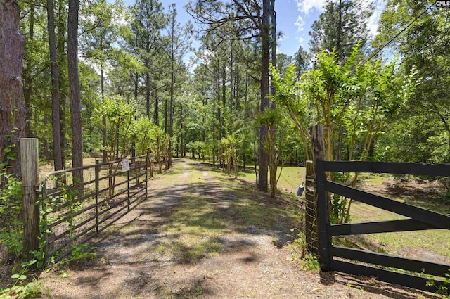 view of road featuring a gate