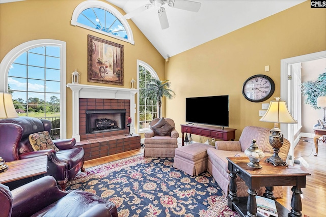 212 Cartgate Cir, Blythewood, SC 29016 - living area featuring ceiling fan, a brick fireplace, high vaulted ceiling, and wood finished floors