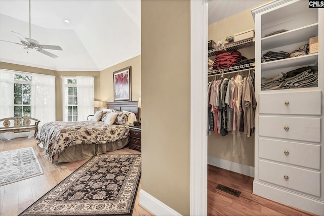 212 Cartgate Cir, Blythewood, SC 29016 - bedroom featuring lofted ceiling, a closet, wood finished floors, visible vents, and a spacious closet