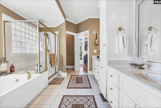 212 Cartgate Cir, Blythewood, SC 29016 - full bathroom featuring a bath, a shower stall, tile patterned flooring, vanity, and crown molding