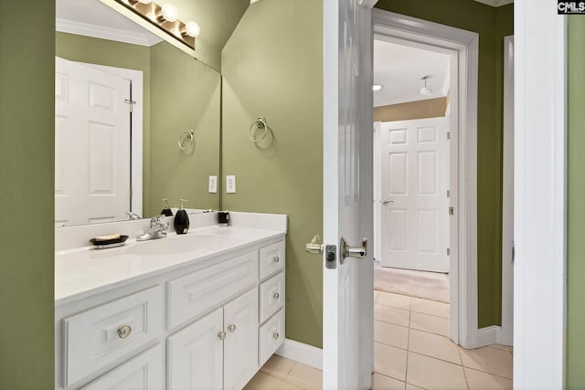 212 Cartgate Cir, Blythewood, SC 29016 - bathroom featuring tile patterned flooring, ornamental molding, baseboards, and vanity