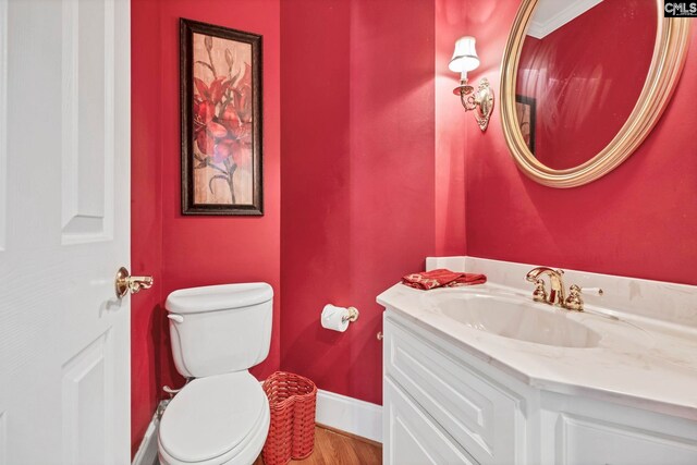 212 Cartgate Cir, Blythewood, SC 29016 - bathroom featuring toilet, vanity, wood finished floors, and baseboards