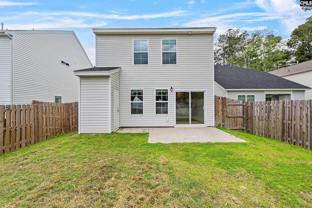 back of property with a patio