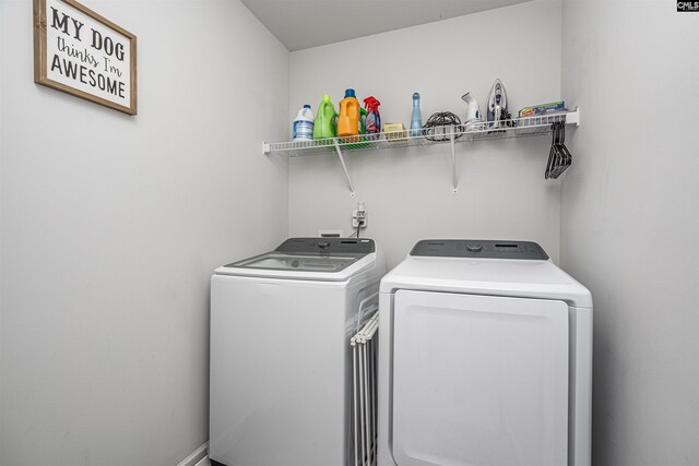 laundry room with washer and dryer