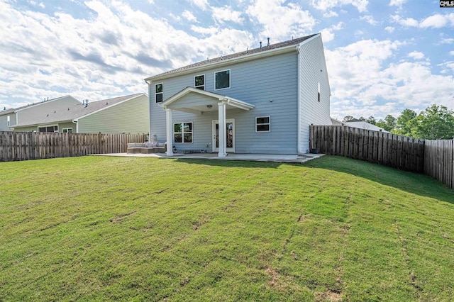 back of house featuring a patio area