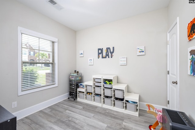 home office featuring wood finished floors and baseboards