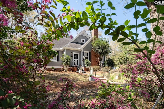 307 Waccamaw Ave, Columbia, SC 29205 - view of front facade with a chimney and roof with shingles