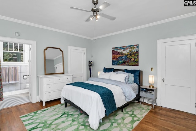 307 Waccamaw Ave, Columbia, SC 29205 - bedroom featuring wood finished floors, crown molding, ensuite bathroom, a ceiling fan, and baseboards