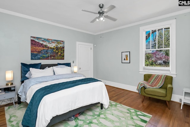 307 Waccamaw Ave, Columbia, SC 29205 - bedroom with wood finished floors, crown molding, baseboards, and ceiling fan