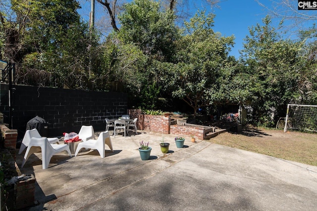 307 Waccamaw Ave, Columbia, SC 29205 - view of patio / terrace featuring outdoor dining space and fence