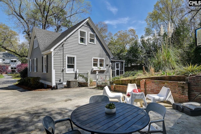 307 Waccamaw Ave, Columbia, SC 29205 - back of property featuring a patio, cooling unit, and roof with shingles