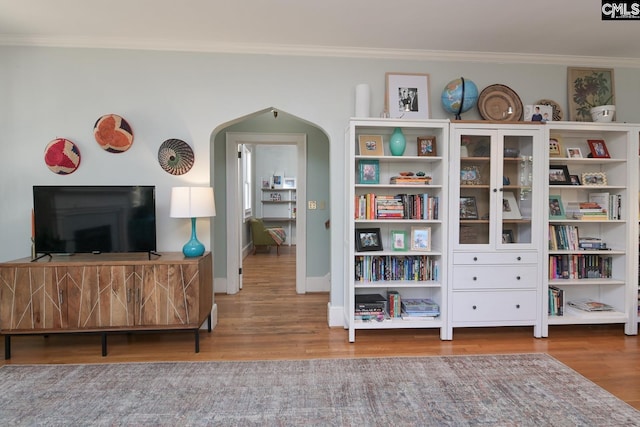 307 Waccamaw Ave, Columbia, SC 29205 - living area with ornamental molding, wood finished floors, arched walkways, and baseboards