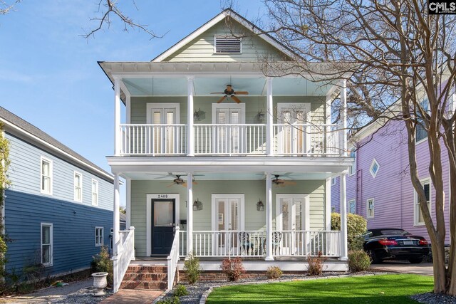 2408 Park St, Columbia, SC 29201 - view of front facade with ceiling fan, a balcony, covered porch, and french doors
