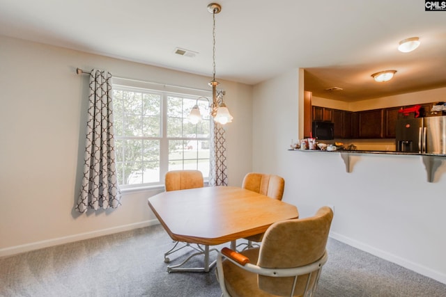 393 Vermillion Dr, Columbia, SC 29209 - carpeted dining room with plenty of natural light and baseboards