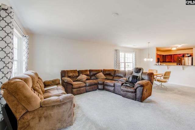 393 Vermillion Dr, Columbia, SC 29209 - living area featuring a chandelier, carpet flooring, and baseboards