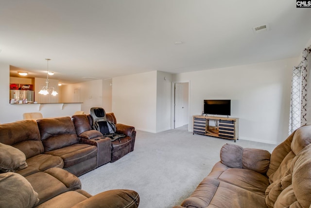 393 Vermillion Dr, Columbia, SC 29209 - living area with carpet, baseboards, and a chandelier