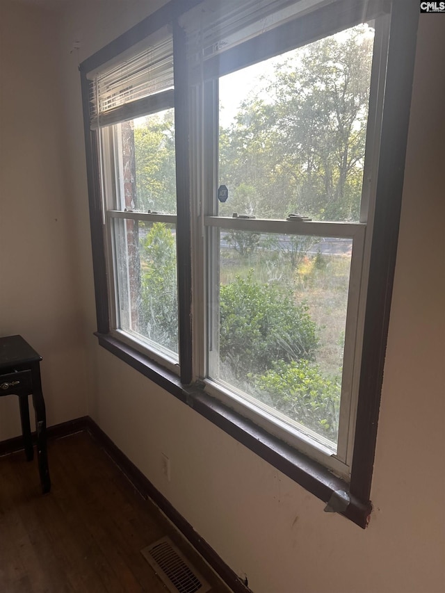 detailed view of wood finished floors and baseboards