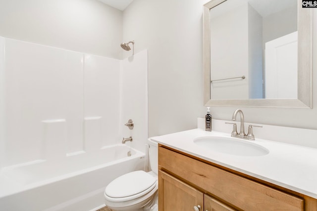 full bathroom featuring toilet, vanity, and bathing tub / shower combination