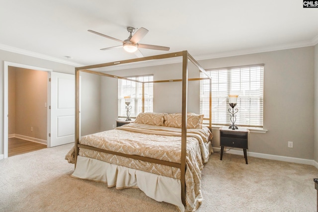 bedroom featuring crown molding, light carpet, baseboards, multiple windows, and ceiling fan