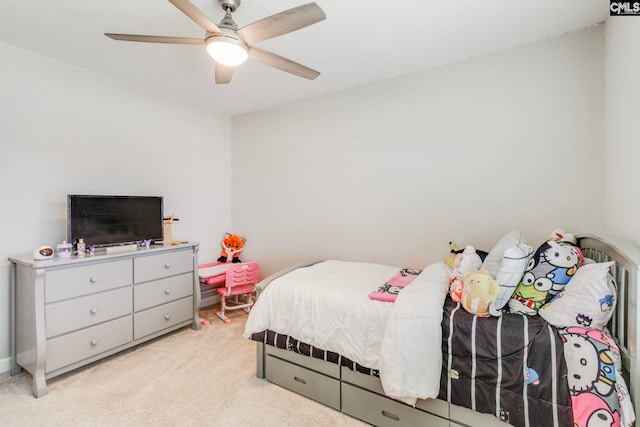 bedroom with light carpet and ceiling fan