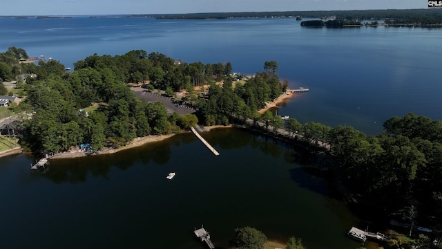 aerial view of property's location with a nearby body of water