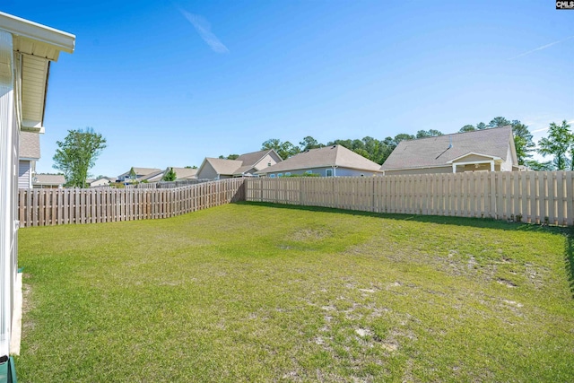 view of yard with a residential view