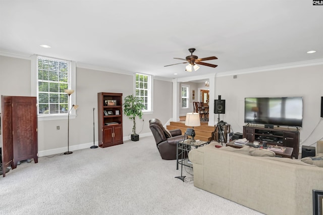 carpeted living area featuring a ceiling fan, ornamental molding, baseboards, and recessed lighting
