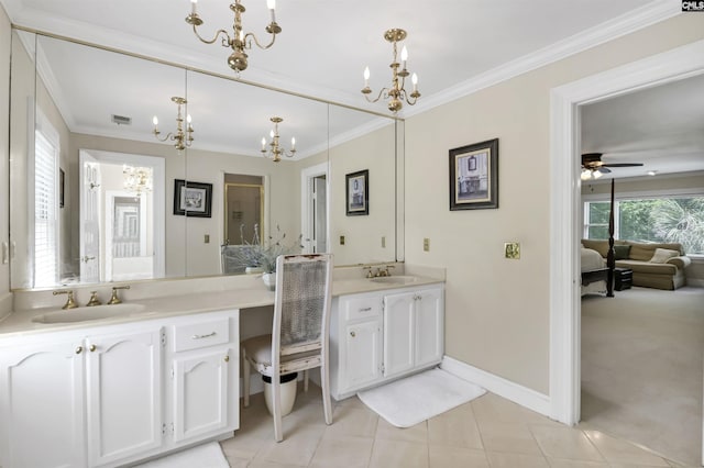 ensuite bathroom featuring a chandelier, vanity, crown molding, tile patterned flooring, and baseboards