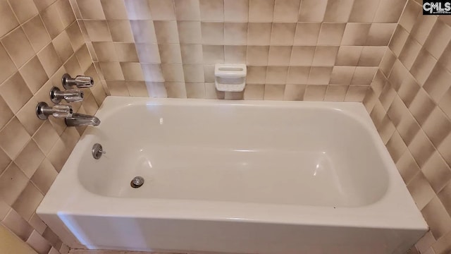 full bath with a bath