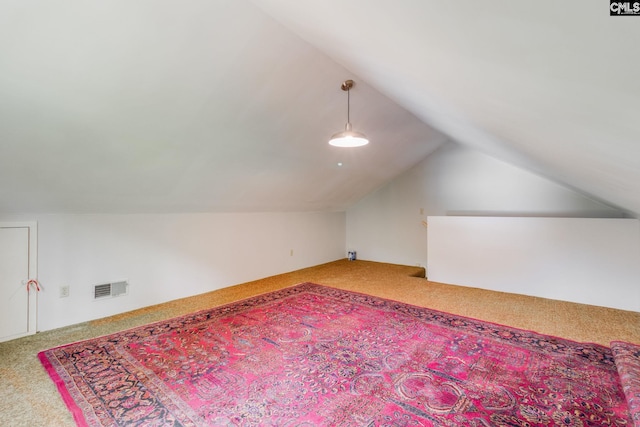 bonus room featuring carpet floors and lofted ceiling