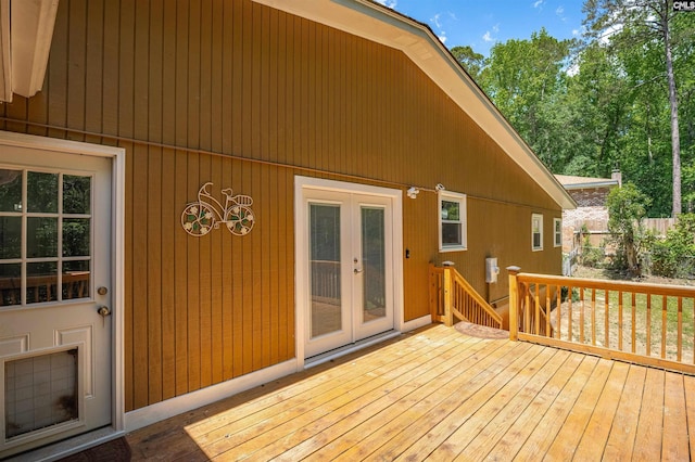 wooden terrace featuring french doors