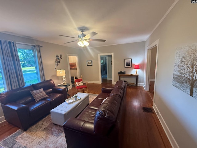 1006 W Main, Ridge Spring, SC 29129 - living area with wood finished floors, a ceiling fan, and baseboards