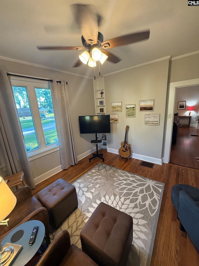 1006 W Main, Ridge Spring, SC 29129 - living area with ceiling fan, wood finished floors, baseboards, and crown molding