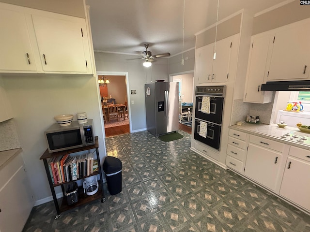 1006 W Main, Ridge Spring, SC 29129 - kitchen featuring appliances with stainless steel finishes, under cabinet range hood, white cabinets, light countertops, and ceiling fan