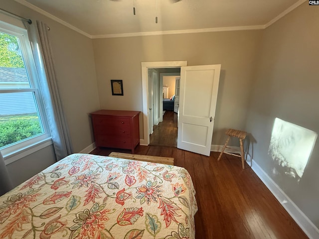 1006 W Main, Ridge Spring, SC 29129 - bedroom with baseboards, wood finished floors, multiple windows, and crown molding