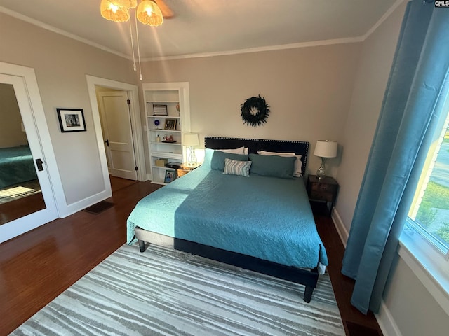 1006 W Main, Ridge Spring, SC 29129 - bedroom featuring dark wood-type flooring, baseboards, and ornamental molding