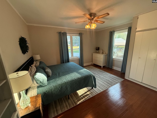 1006 W Main, Ridge Spring, SC 29129 - bedroom with wood finished floors, ornamental molding, a ceiling fan, and baseboards