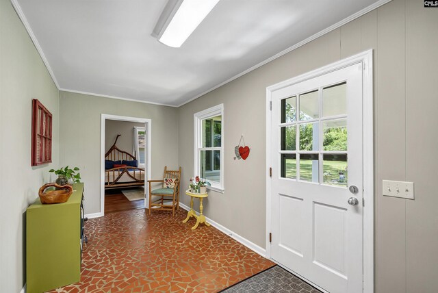 1006 W Main, Ridge Spring, SC 29129 - doorway to outside with baseboards and crown molding