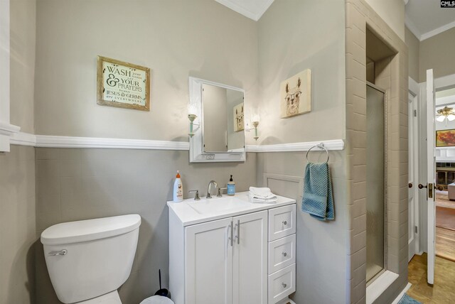1006 W Main, Ridge Spring, SC 29129 - full bath featuring a shower stall, ornamental molding, toilet, and vanity