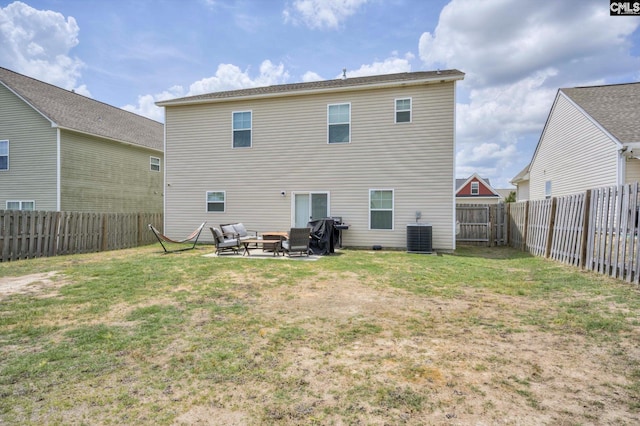 back of house with a fire pit, a patio, and central AC